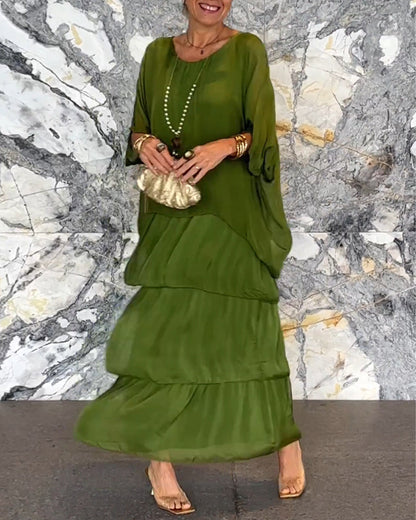 Robe longue artistique : coupe ample, design de manches chauve-souris et élégance fluide