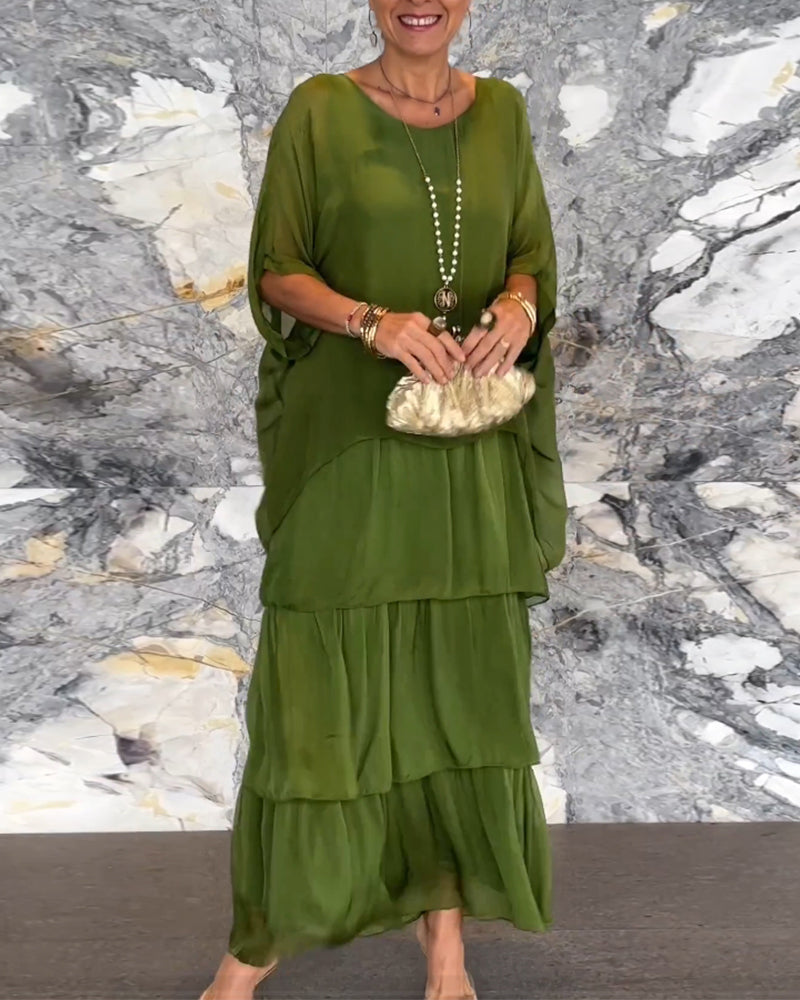 Robe longue artistique : coupe ample, design de manches chauve-souris et élégance fluide
