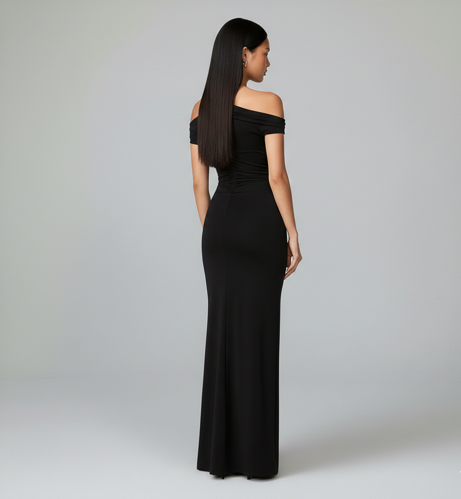 Vestido Elara – Maxi negro, escote asimétrico y hombros descubiertos, estilo socialité