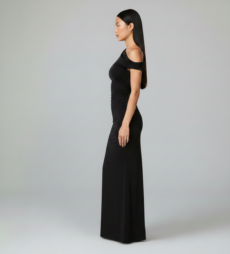 Vestido Elara – Maxi negro, escote asimétrico y hombros descubiertos, estilo socialité