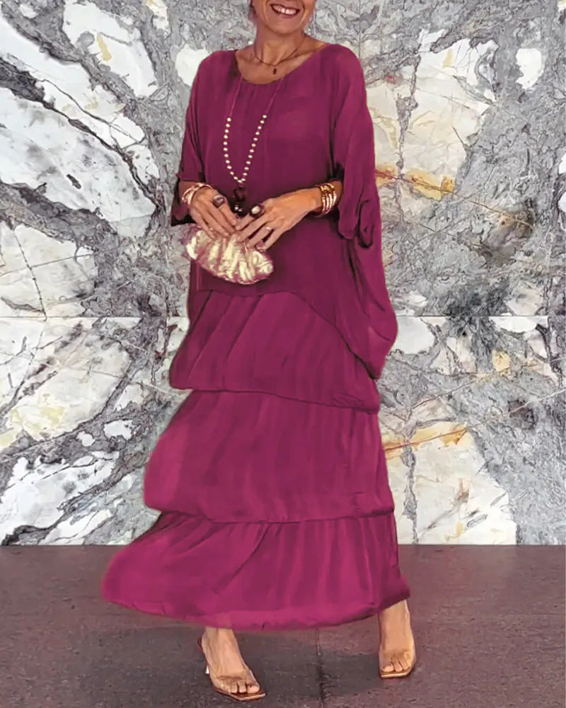 Robe longue artistique : coupe ample, design de manches chauve-souris et élégance fluide
