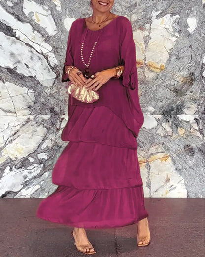 Robe longue artistique : coupe ample, design de manches chauve-souris et élégance fluide