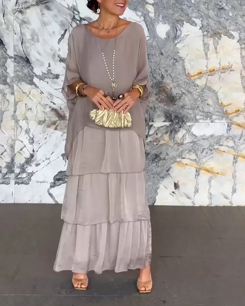 Robe longue artistique : coupe ample, design de manches chauve-souris et élégance fluide