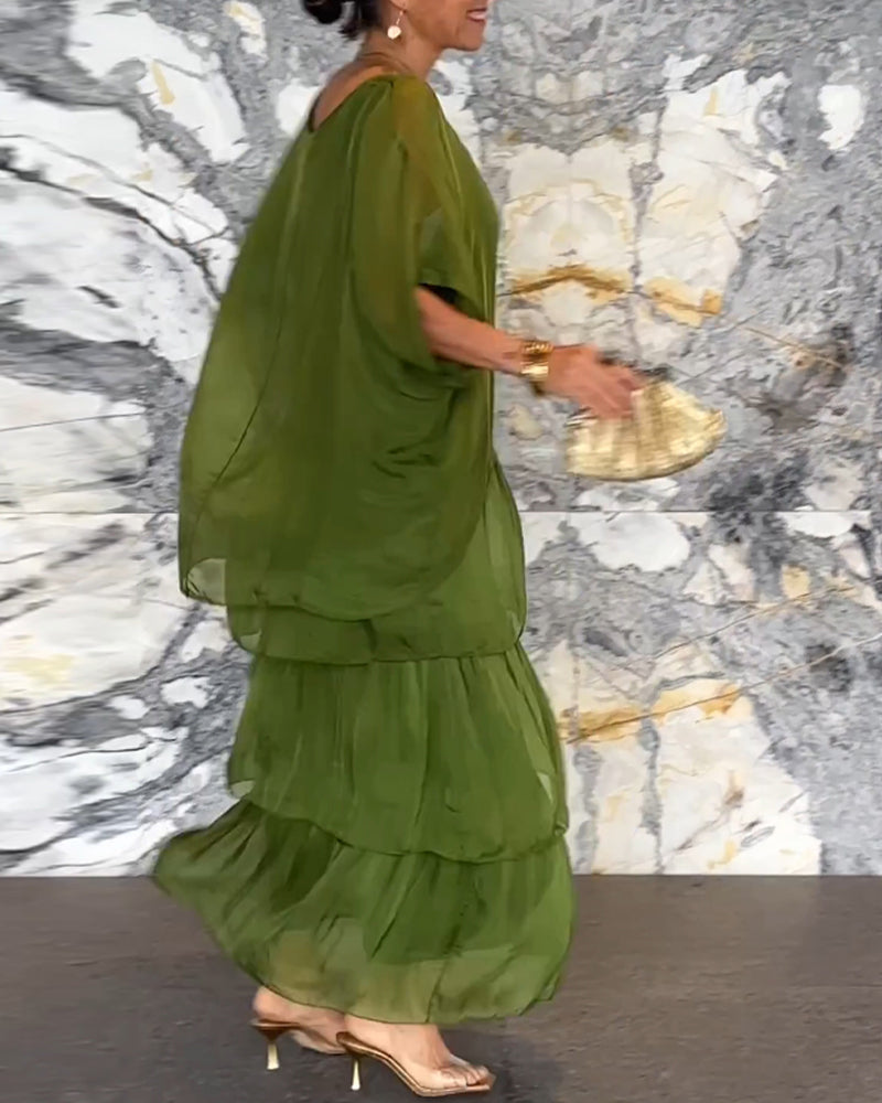 Robe longue artistique : coupe ample, design de manches chauve-souris et élégance fluide