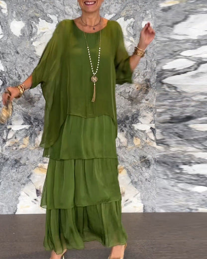 Robe longue artistique : coupe ample, design de manches chauve-souris et élégance fluide