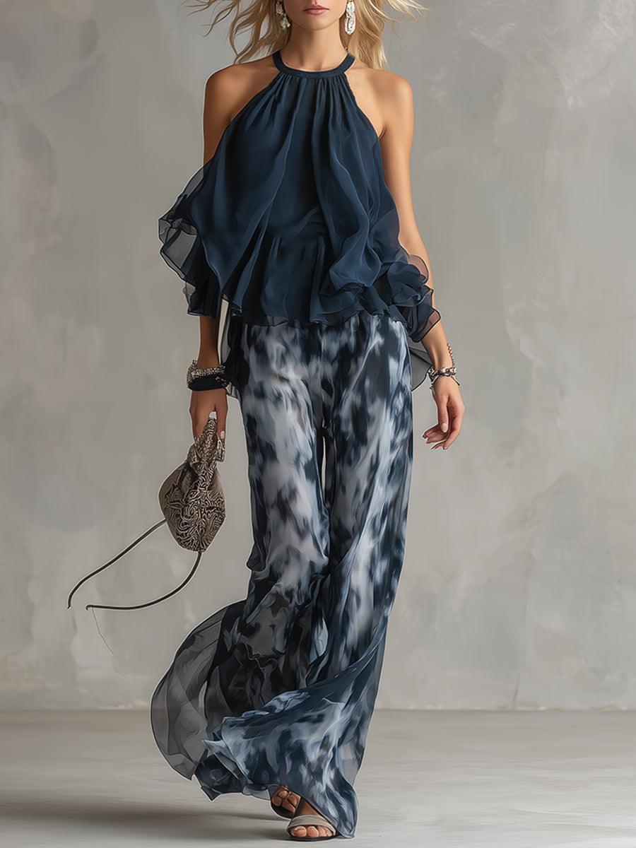 Ludovica : un élégant ensemble en georgette avec top à col haut et pantalons larges imprimés